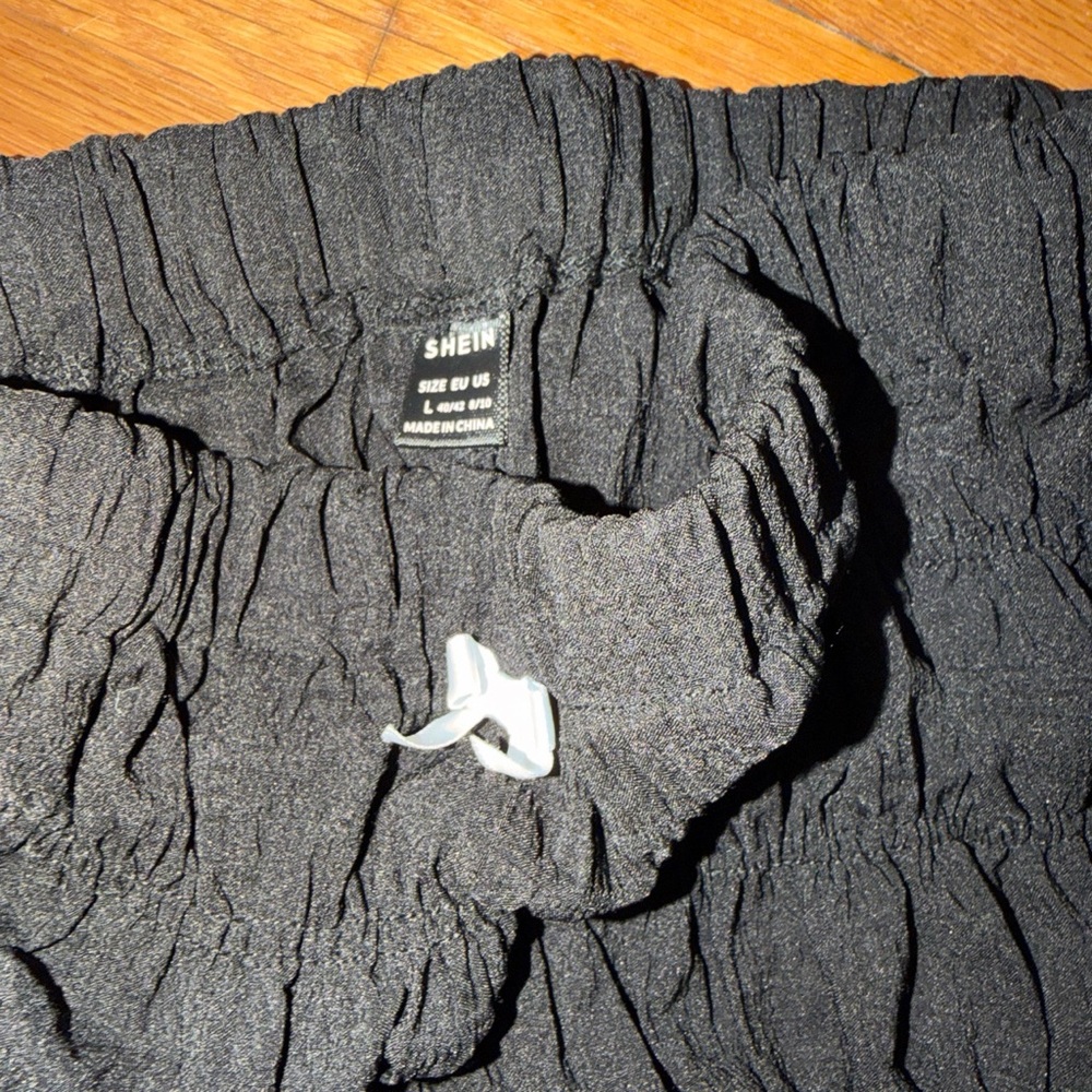 SHEIN Black Smocked Ruffle Waistband Shorts - Picture 3 of 3